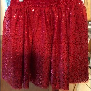 Girl’s red sequined skirt